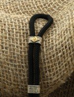 Браслет из серебра 925 пробы и золота 585 пробы c ониксом и шёлковым шнурком
